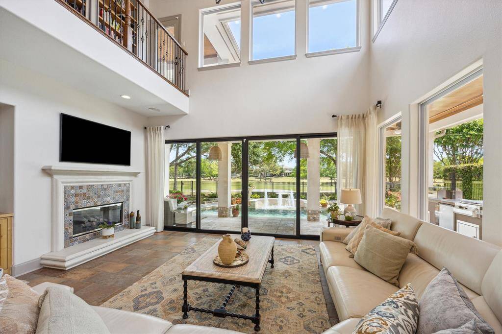Two story living area with balcony. Perfect entertaining area! Just look at the view.