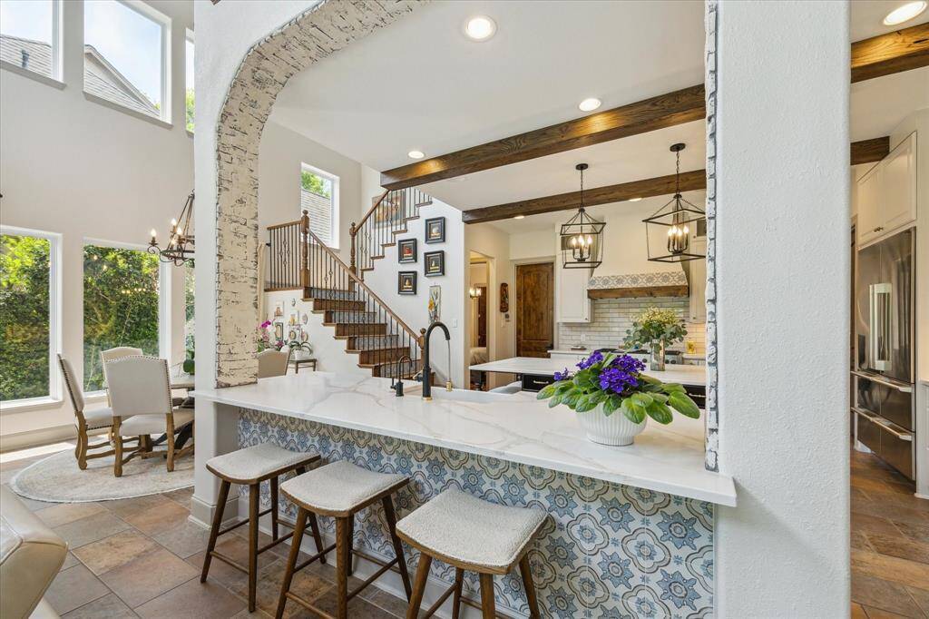 Tiled bar front, bricked arch, all new lighting and reclaimed beams are just a few of the details.