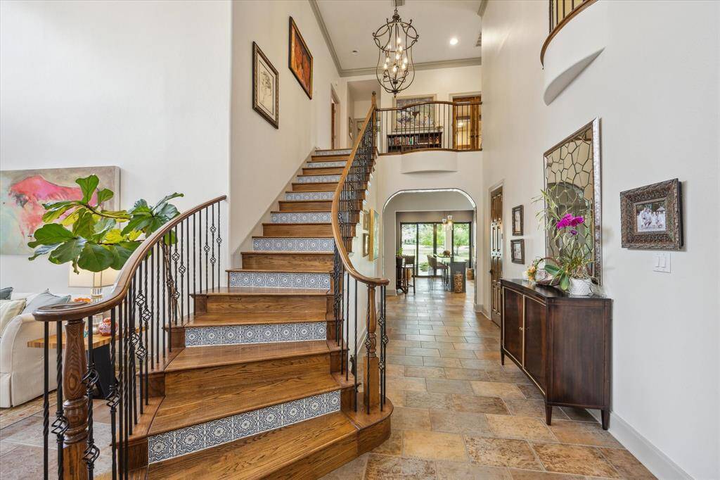 Main stairway with Spanish tile risers and wood treads
