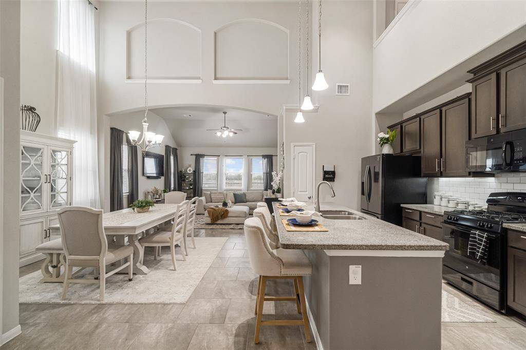 Cathedral ceilings and a seamless open concept create the perfect flow for everyday living