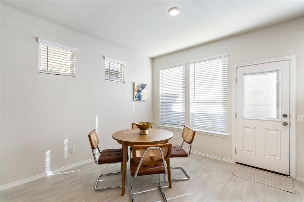 Share meals and host game nights in the designated dining area located off the kitchen and living room.