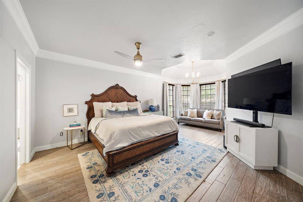 Retreat to the luxurious primary suite, a sanctuary of comfort with a fully renovated spa-like bathroom.