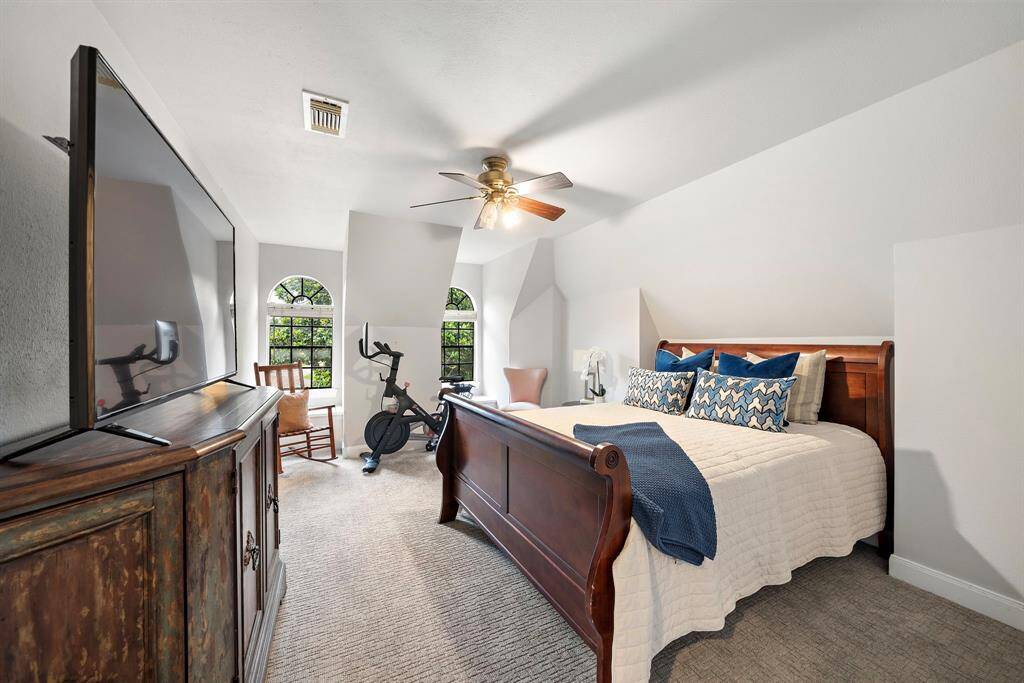 Another secondary bedrooms featuring a walk in closet.