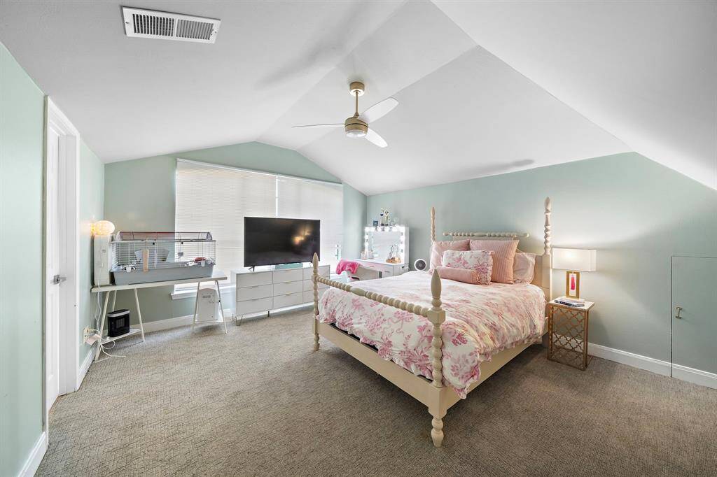 This secondary bedroom offers its own private bathroom.