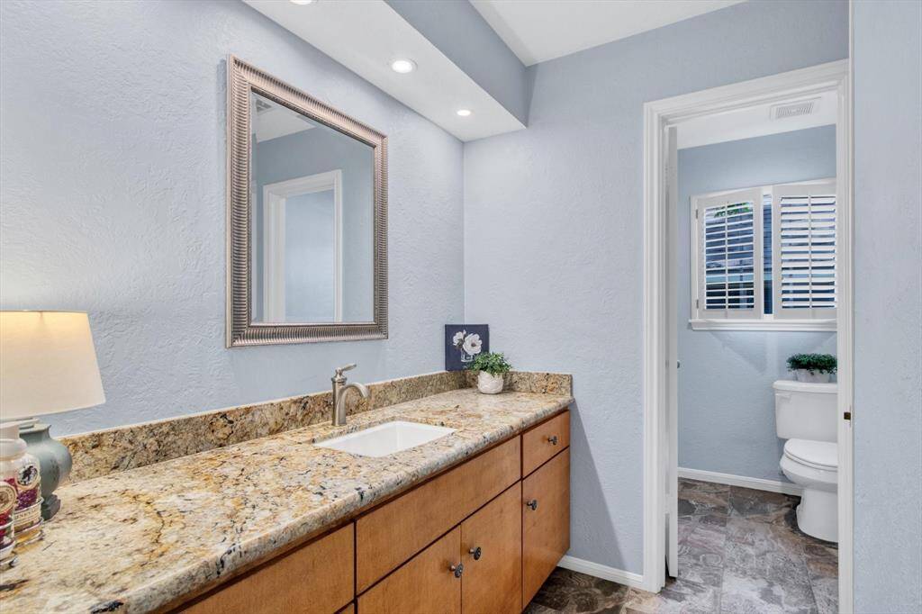 Upstairs full bath 1 with the consistent counters, cabinets and hinges:)