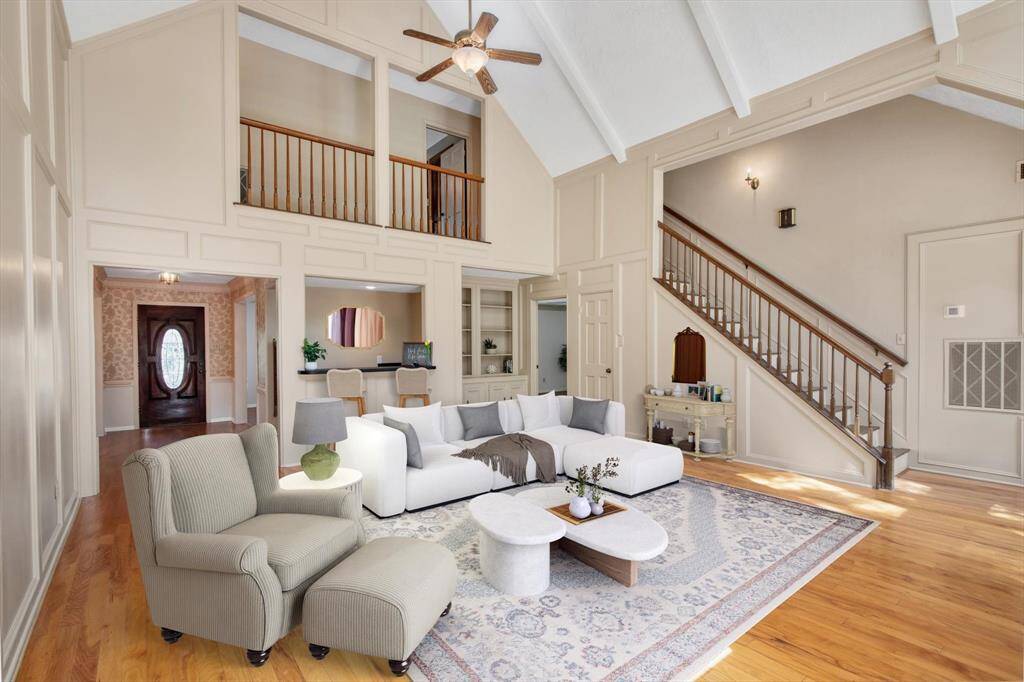 Coming in the front door, you have a spacious entry with the dining room to your right, and formal living to your left.  Wet bar in the den offers additional entertaining space for you.