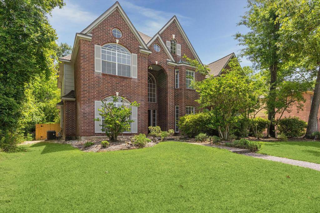 Beautiful curb appeal with this Sand Creek home. Look at the new fence.