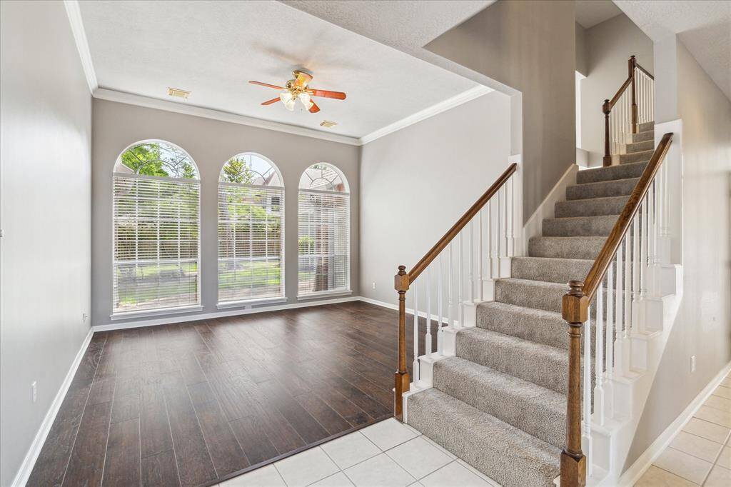 How would you like 2 family rooms and 2 stairways?