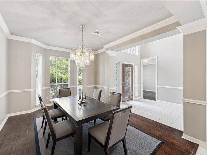 Large dining area. Digitally staged