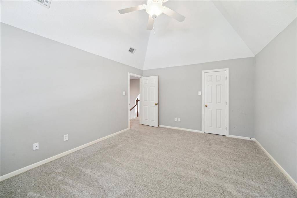 This secondary bedroom upstairs can host large furniture and host a huge closet.