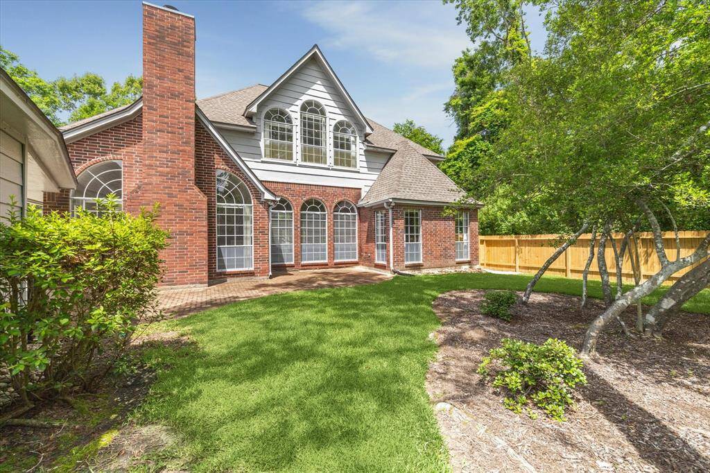 Look at the expansive patio running the length of the home.