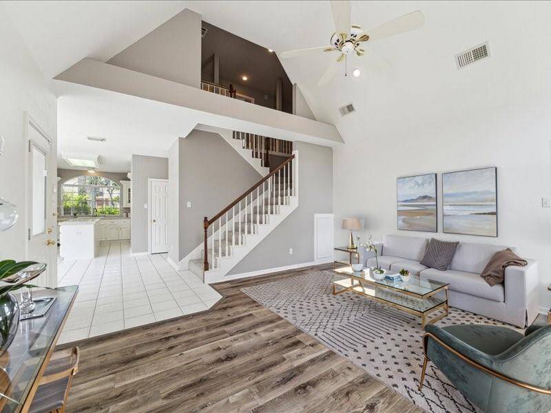 Look at this family area just off the large kitchen.  Digitally staged