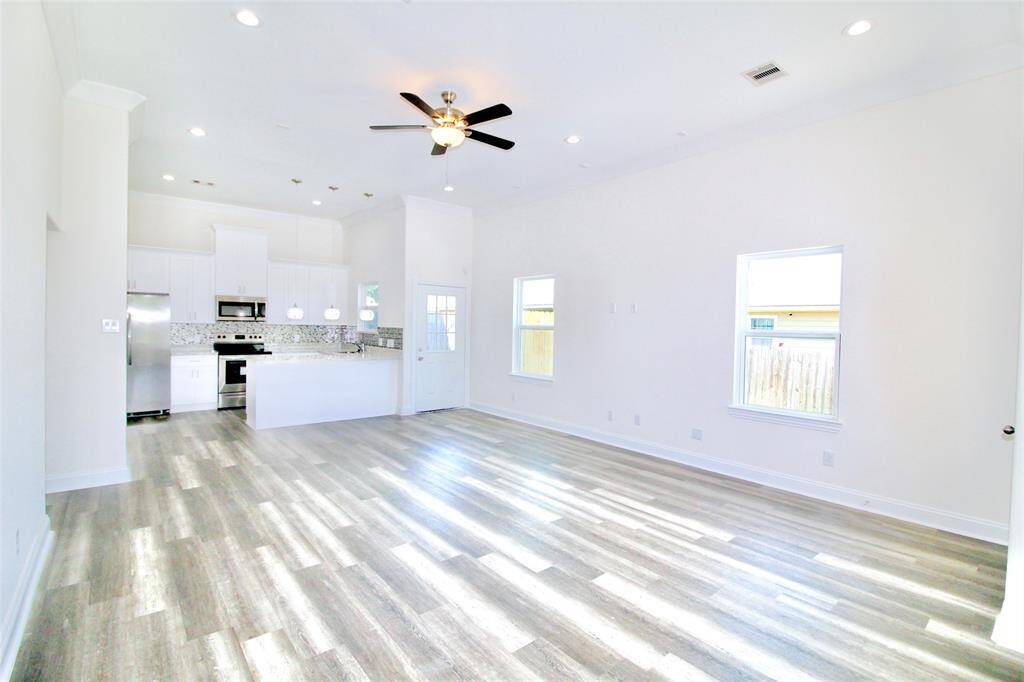 Spacious kitchen/living room combo- "Home is Occupied"
