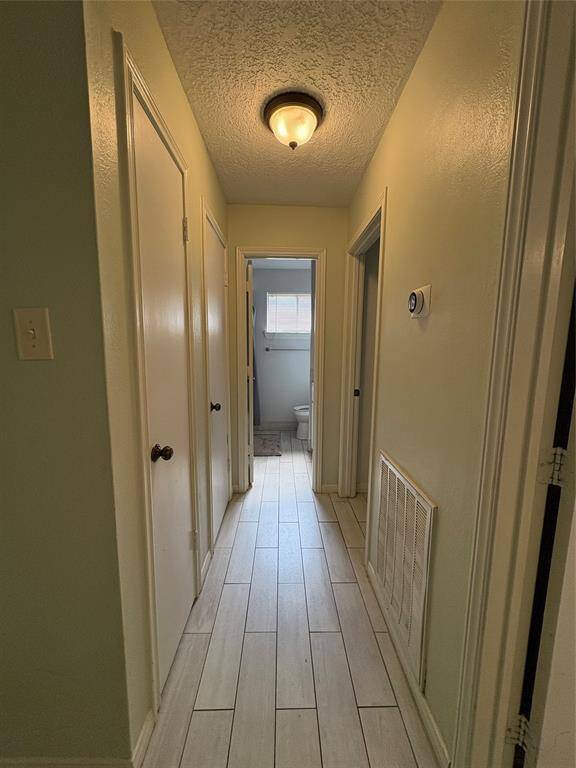Hallway towards all 3 bedrooms.