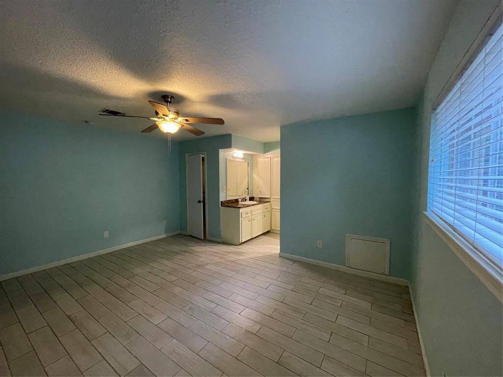 Primary bedroom, and another view of the powder area, and well lighted.