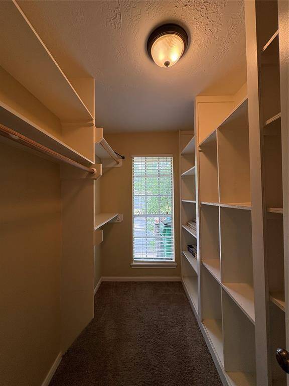Pantry/laundry room combo with lots of storage space.