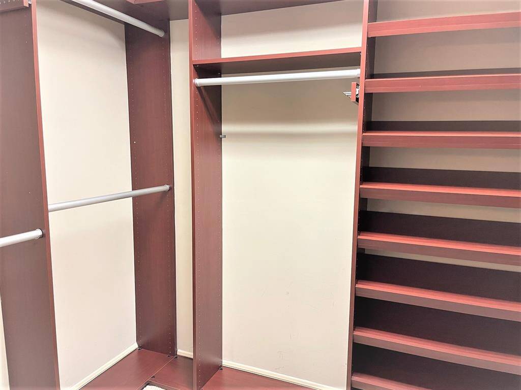 Primary custom closet arrangement