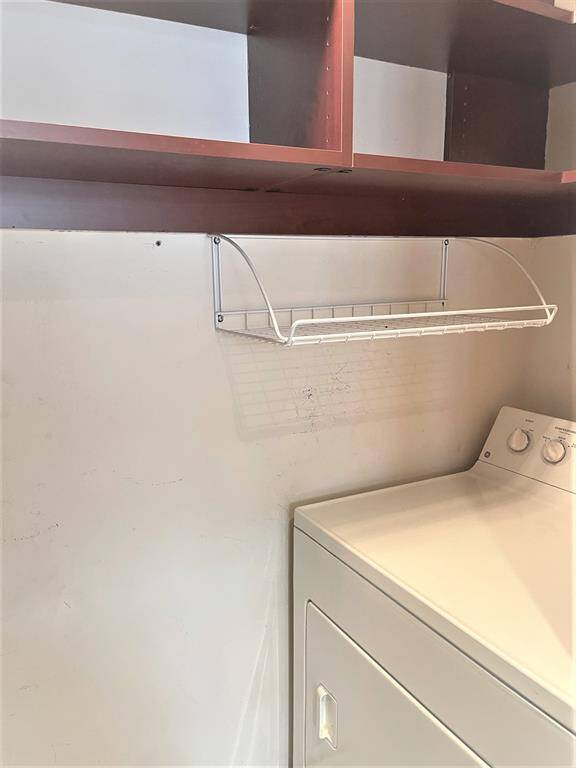 Dryer on opposite side of laundry area