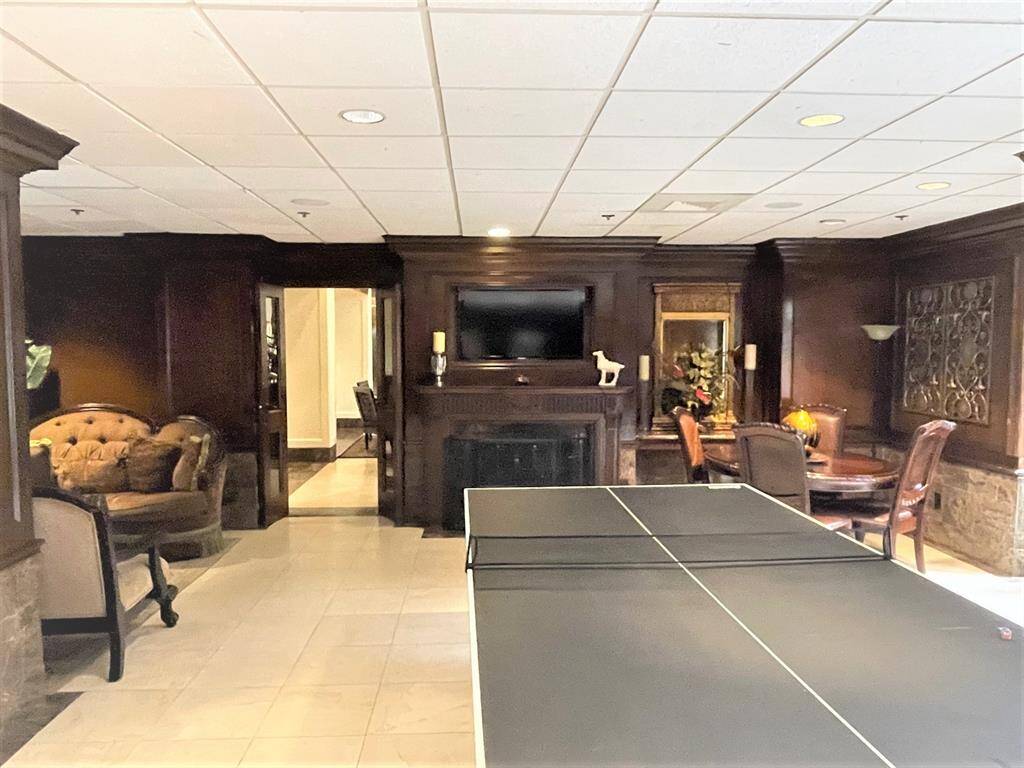 Club room table tennis and fireplace