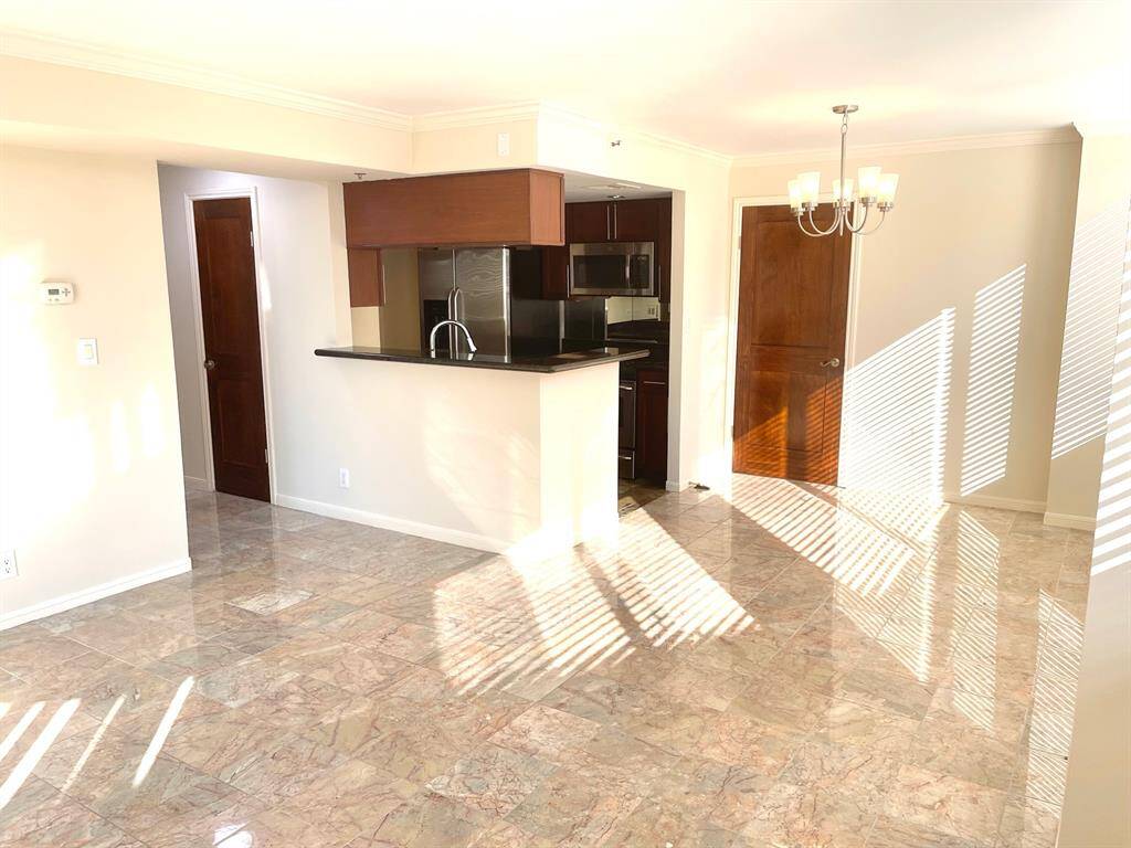 Kitchen is adjacent to the dining area.