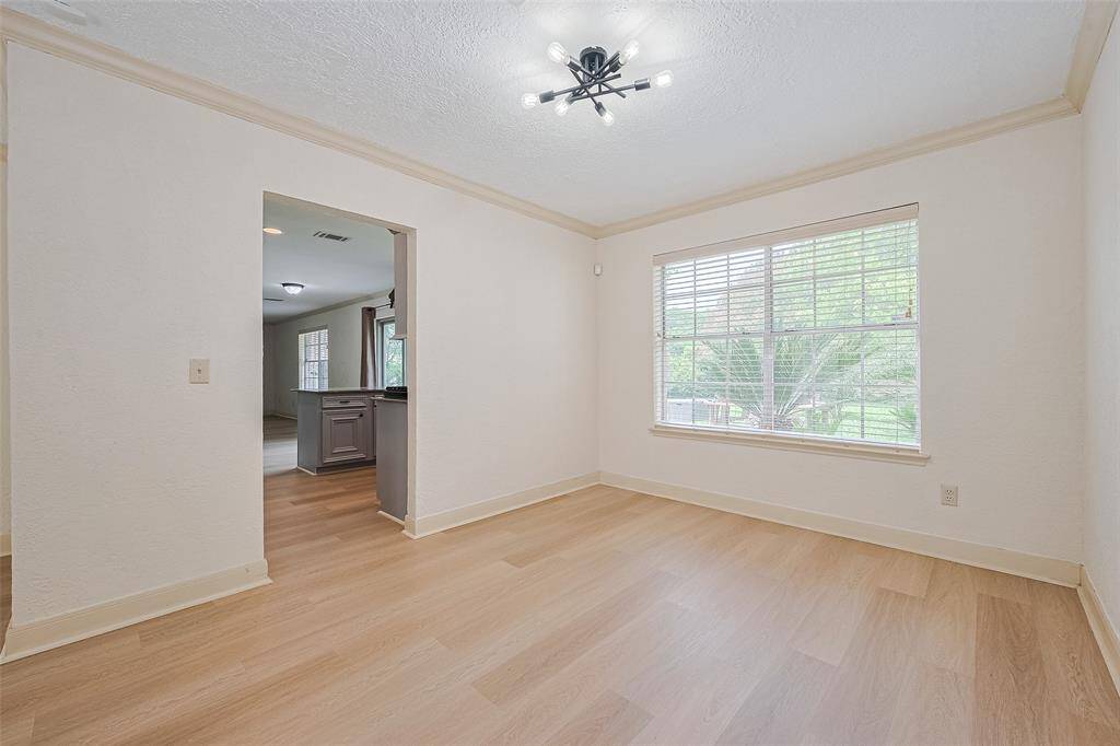 Formal dining area by kitchen
