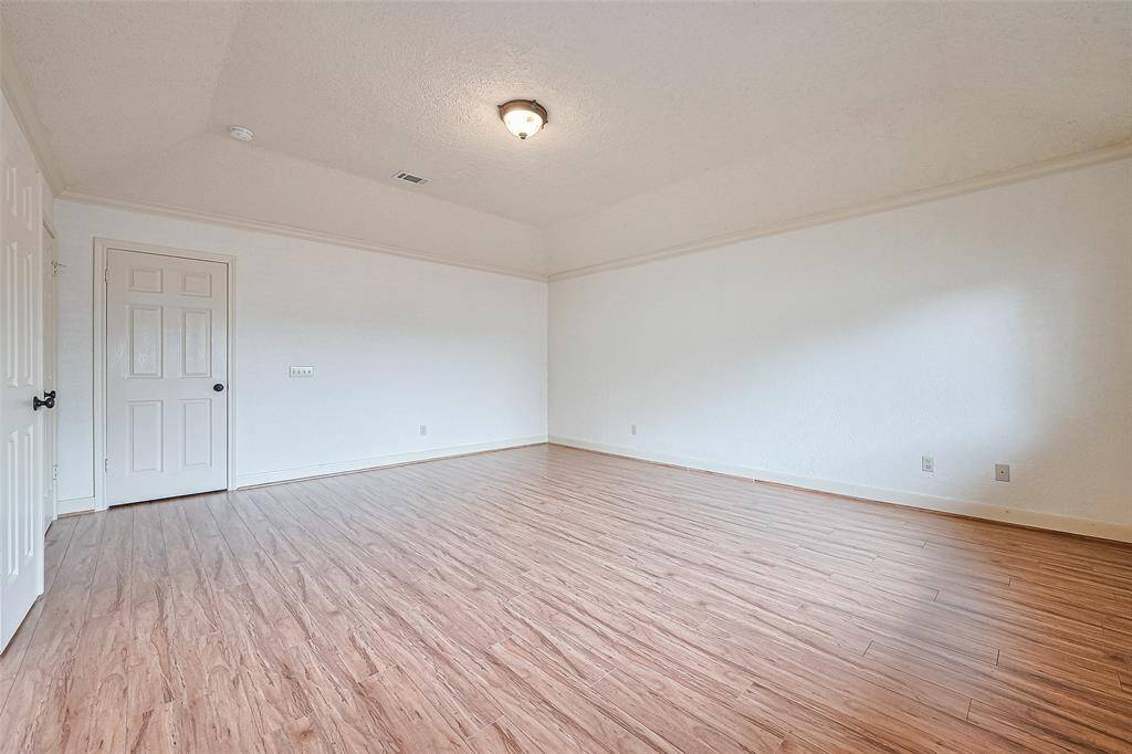 Spacious primary suite on 2/F