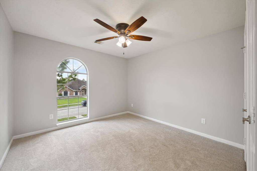 Secondary bedroom with double closets.