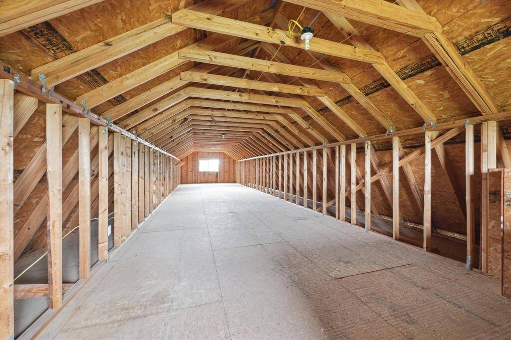 Around 850 sq ft of unfinished space with electrical.