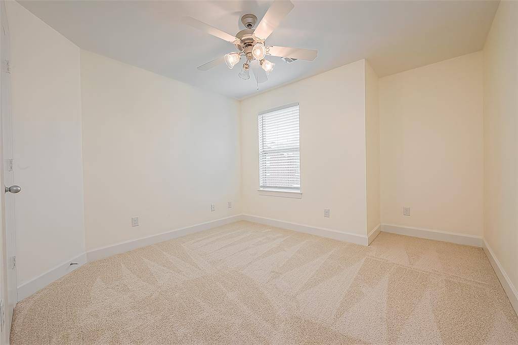 The third bedroom offers ample space for rest and relaxation. Ideal for guests.
