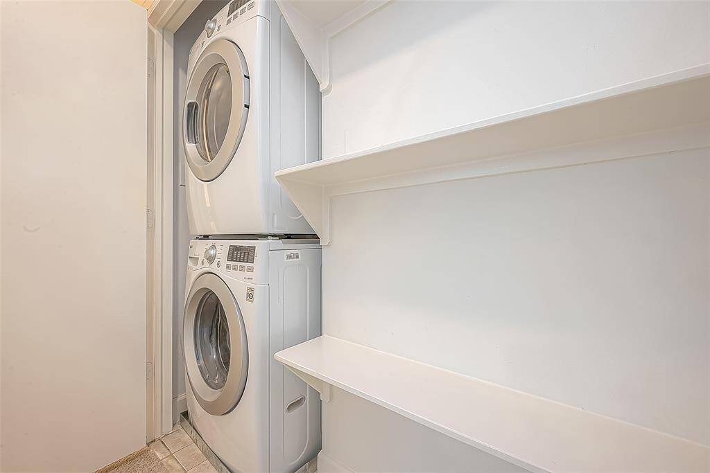 The utility room is conveniently located in the house offering easy access for completing daily chores.
