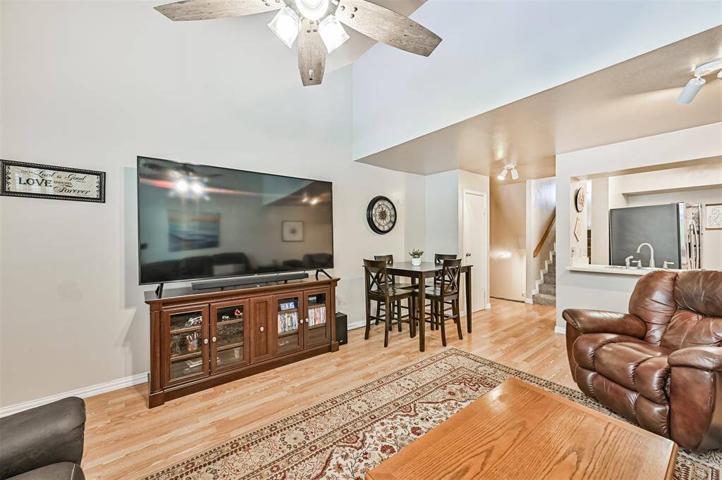 Living area with roaring high ceilings.