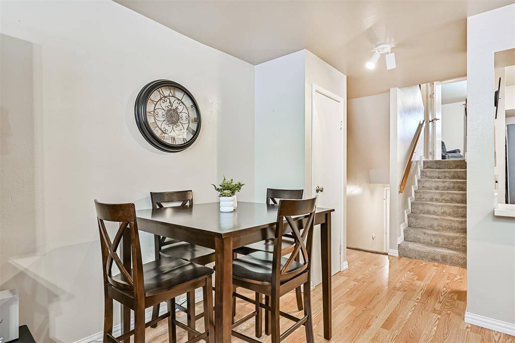 Open dining area with natural light and seamless flow from the living room, great for gatherings.