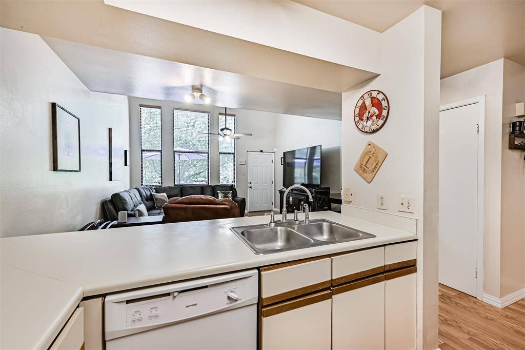Kitchen view toward living area.