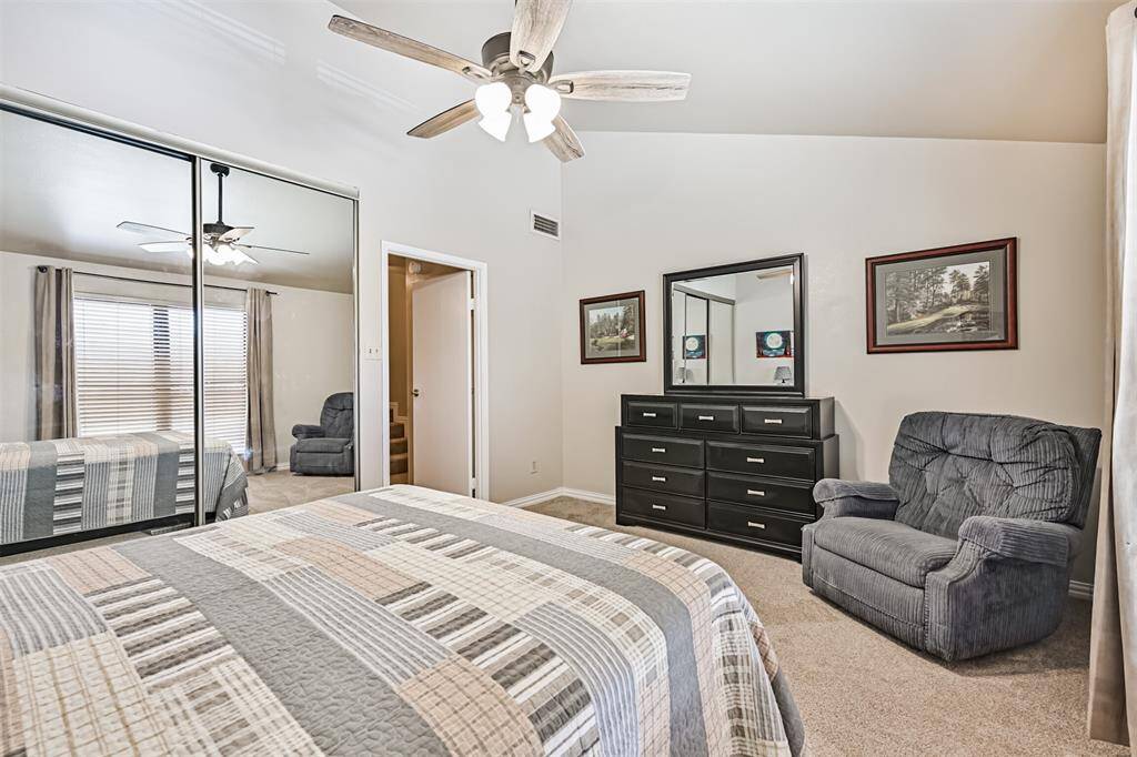 Another view of primary bedroom.