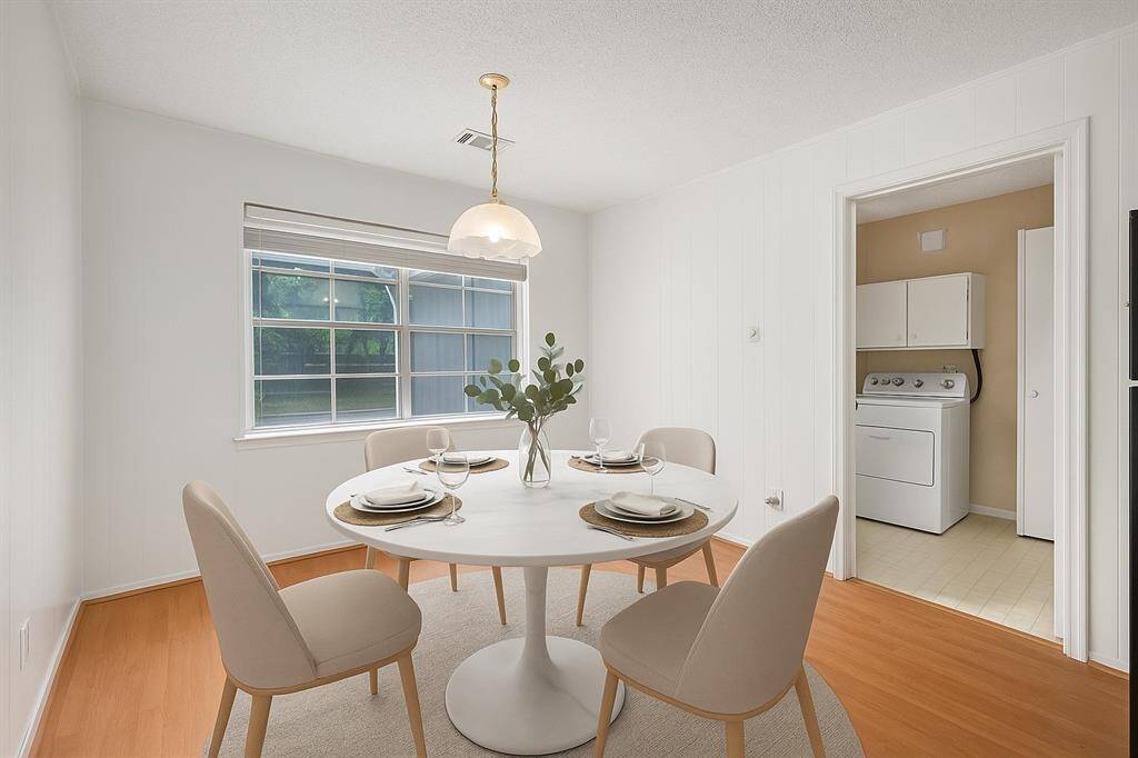 Adorable breakfast nook off the kitchen. (Virtually Staged)