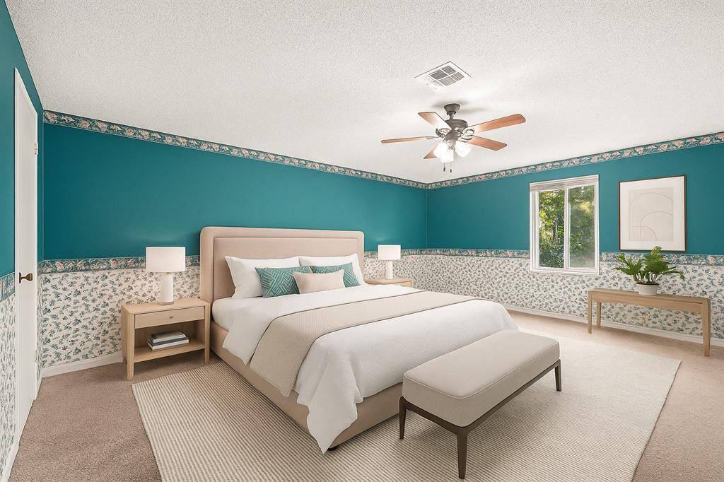 Spacious upstairs primary bedroom. (Virtually Staged)
