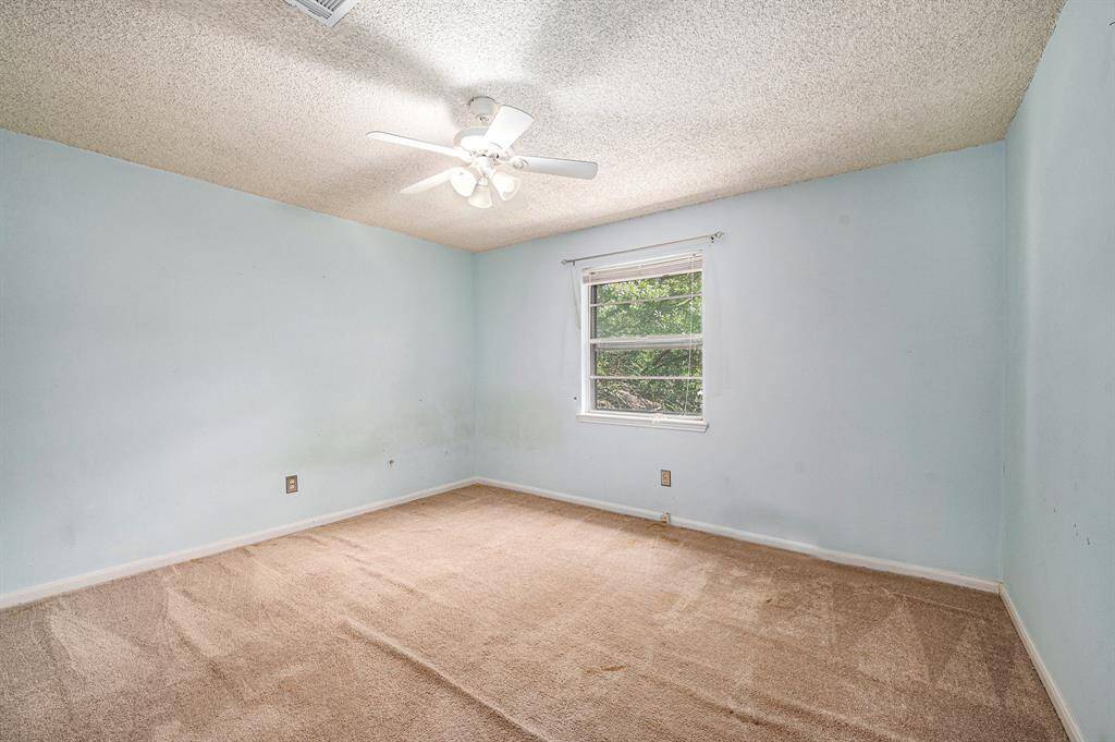 Another secondary bedroom with a walk-in closet.