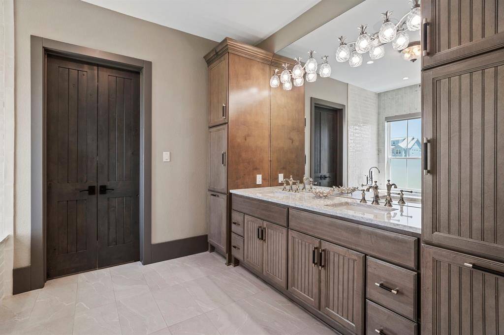 Plenty of storage on either side of the double sinks.