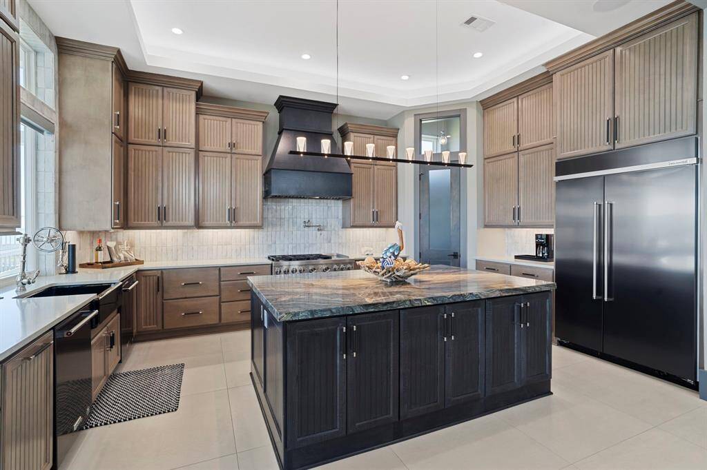 Sophisticated and functional kitchen will make entertaining easy. Storage, storage and more storage.