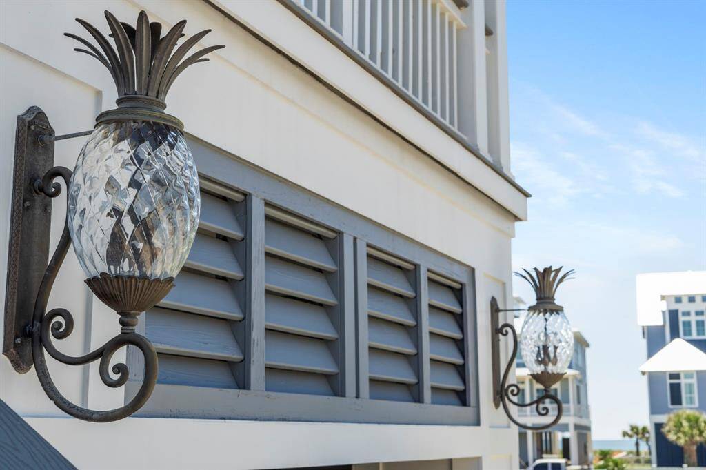 Enchanting light fixtures add depth and charm. Wait until you see these aglow at sunset.