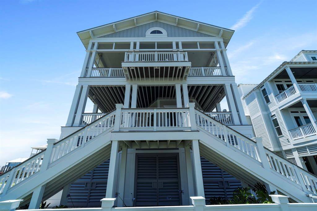 Impressive staircase and balconies provide architectural appeal.