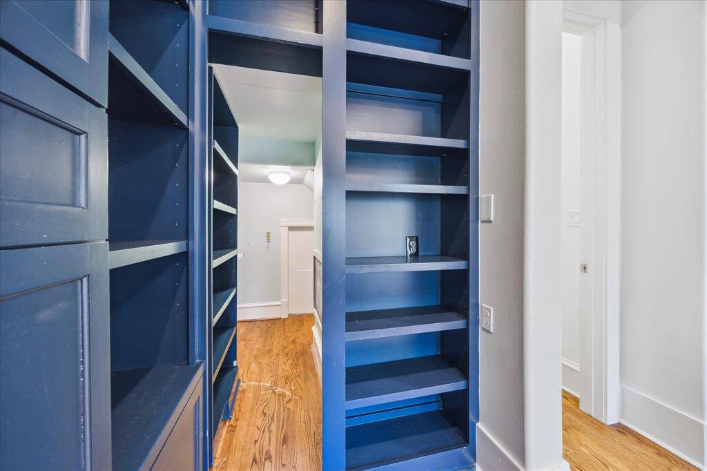 Cleverly designed play space hidden behind a book case.