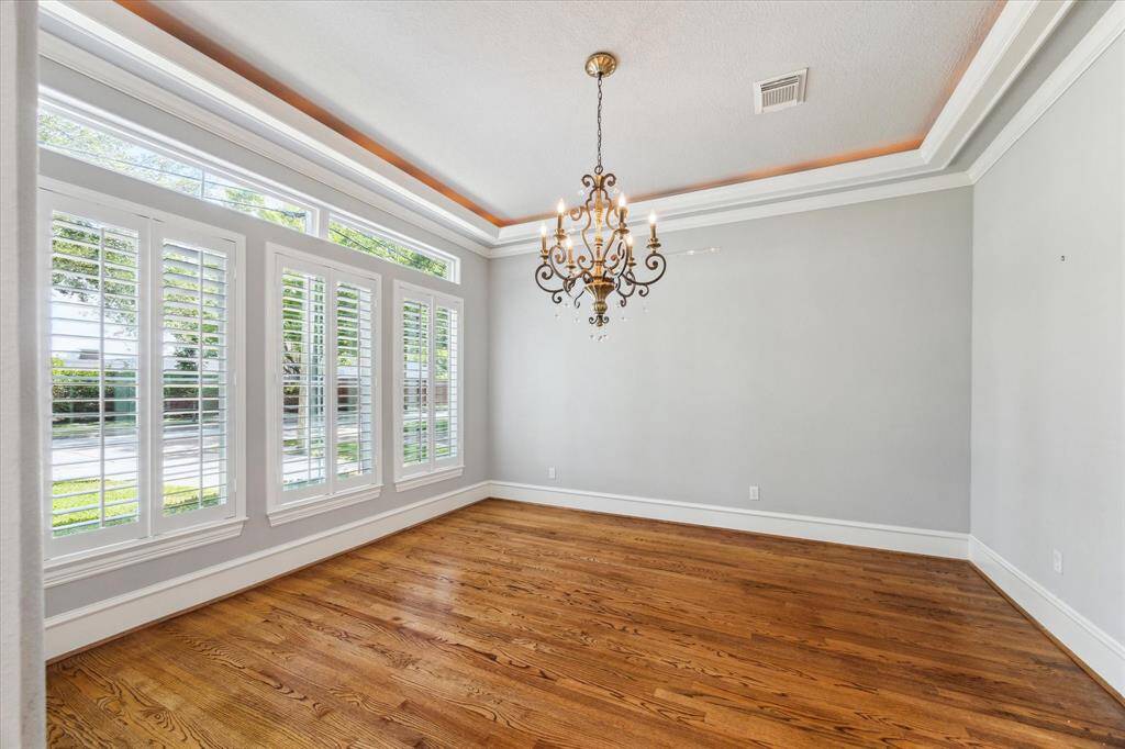Spacious dining room with ample light.