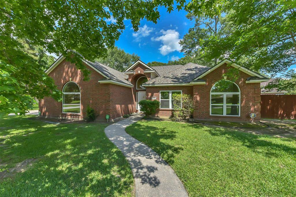 Welcom HOME to this Charming brick home with large Custom arched windows and a welcoming walkway, nestled in a lush greenery atmosphere with mature trees and peaceful living!