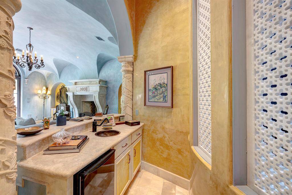 Wet bar off of living room w/ marble screens from India