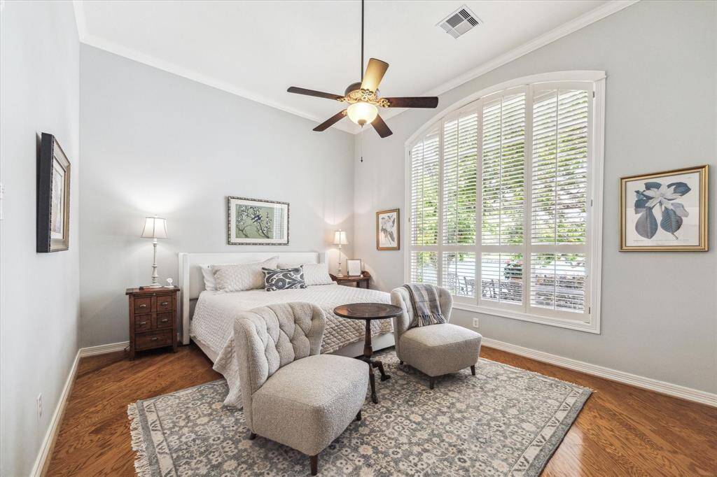 Spacious primary bedroom is the perfect retreat.  The soft decor is inviting and soothing!