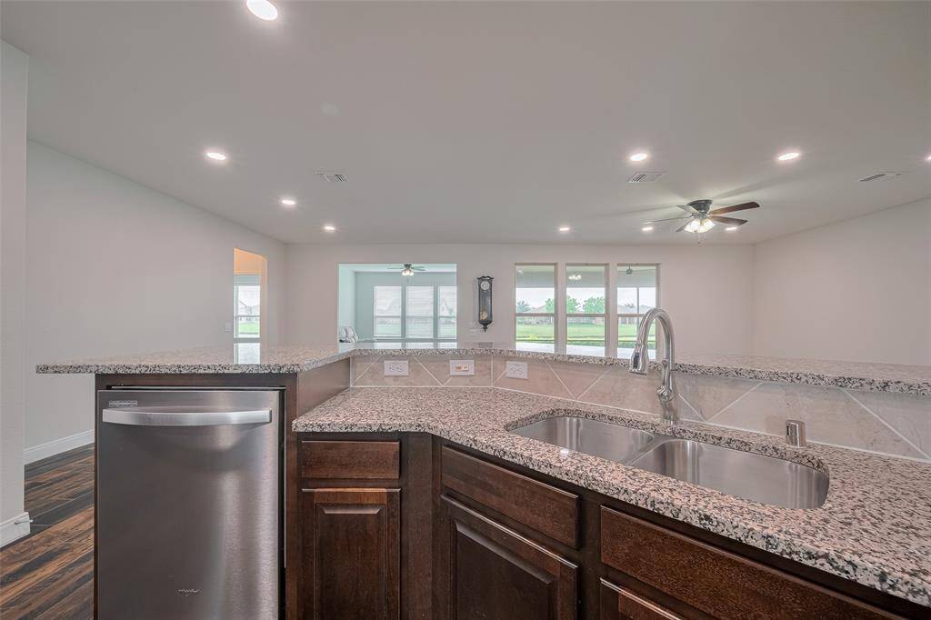 You will love the double sinks and raised dishwasher.