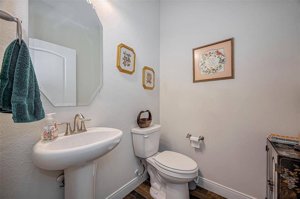 This home offers a half bath off the main hallway and next to the study.