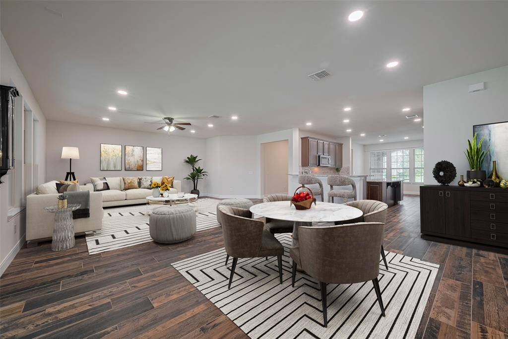 You will love the open concept of the living, dining and kitchen!  Plenty of room for family gatherings. Virtually staged.