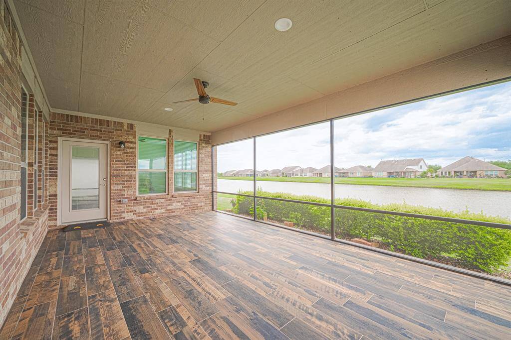 Another view of the screened in porch!  No bugs and a ceiling fan to help cool the hot summer days.